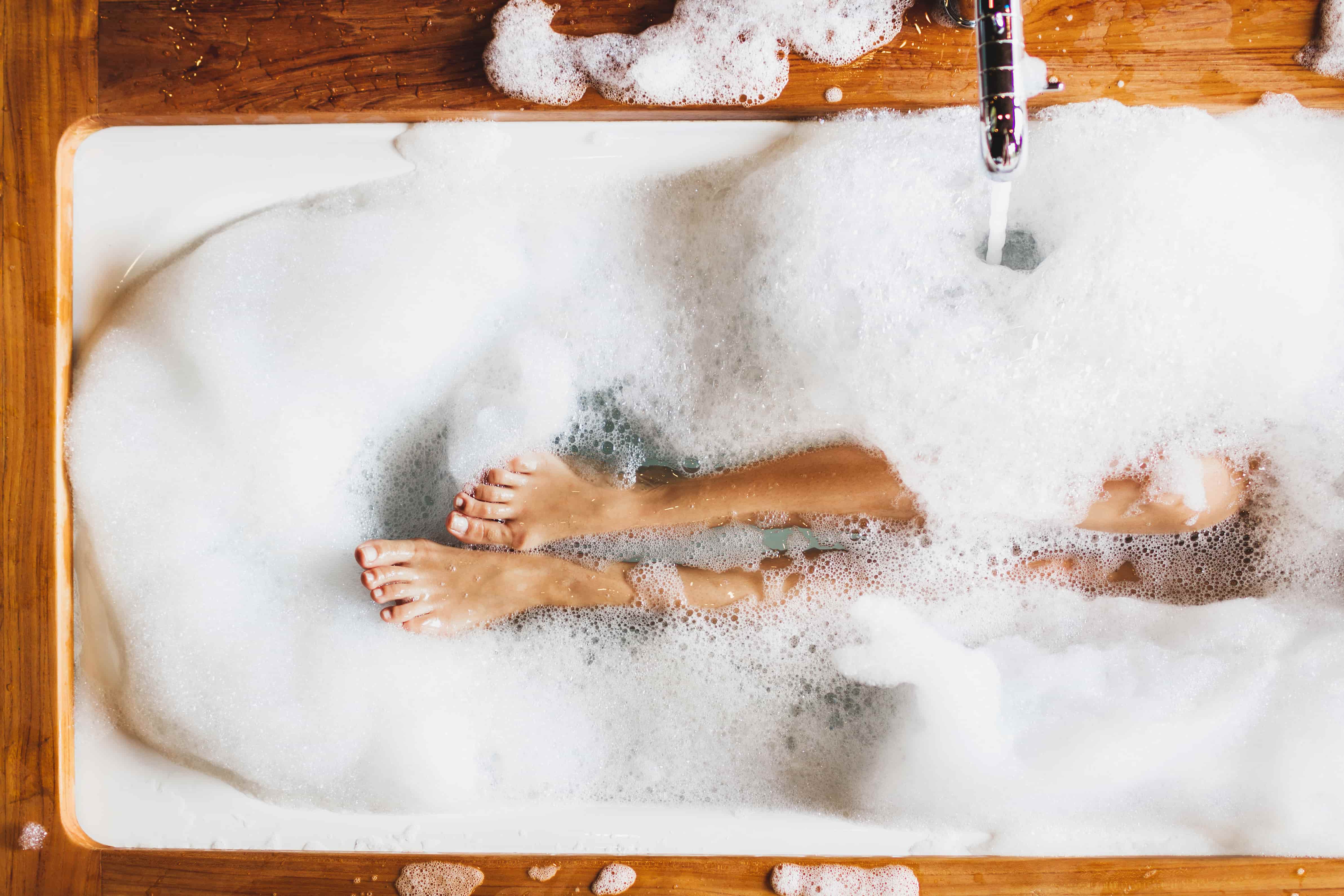 woman relaxing in a bathtub